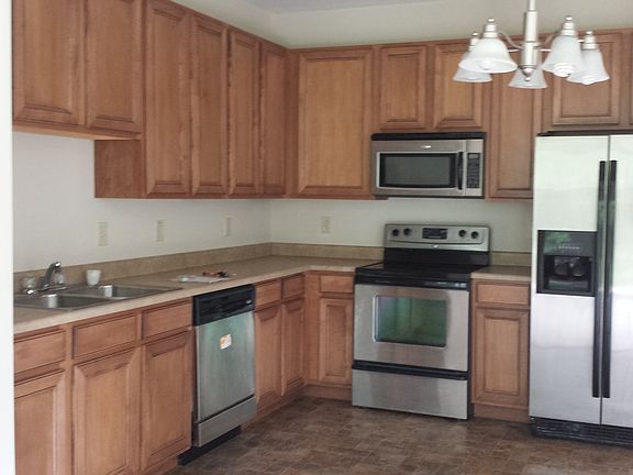 Spacious kitchen with tall cabinets