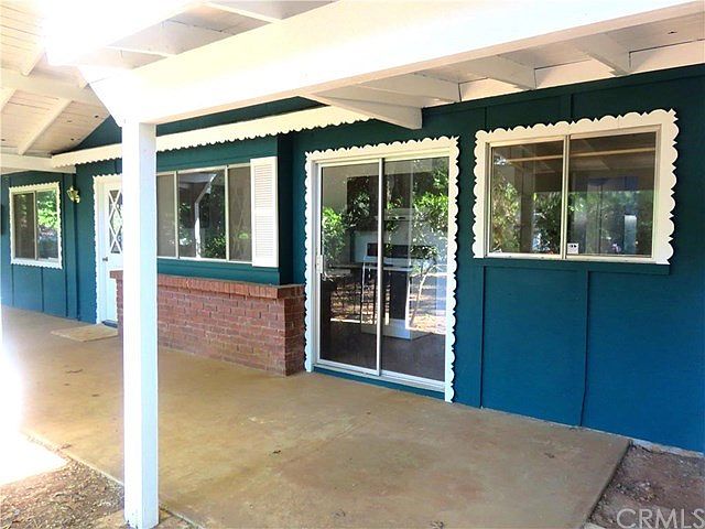 Front Porch, slider enters into Kitchen