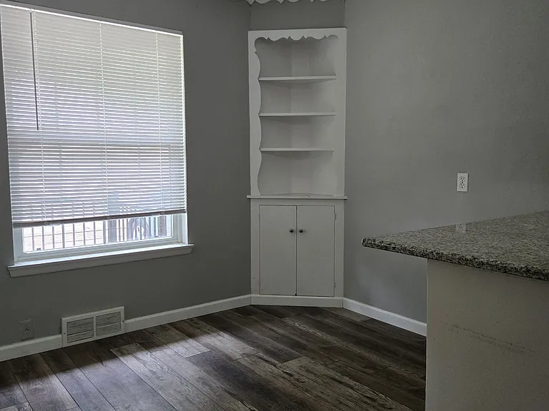 This is the breakfast nook at the end of the kitchen which has a view of the backyard.