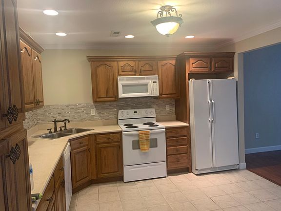 Kitchen with new backsplash and lots of cabinets!