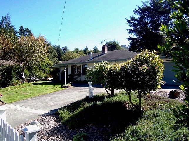 Beautifully landscaped, partially fenced, recently painted