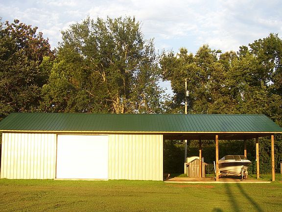 large shop with 2 car carport