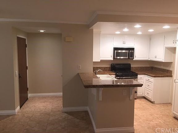 looking at the front entry area. Room for barstools.