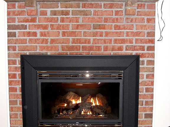 Thermostat-Controlled Fireplace Insert