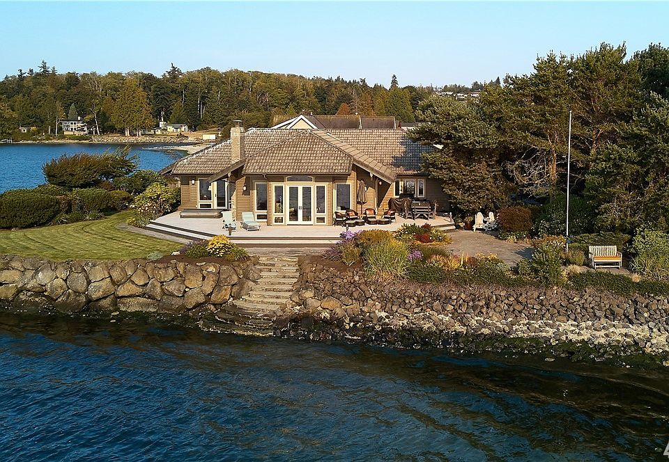 Incredible home set on a private point directly on the Hood Canal with sweeping views of the Olympic Mountain Range and spectacular sunsets!