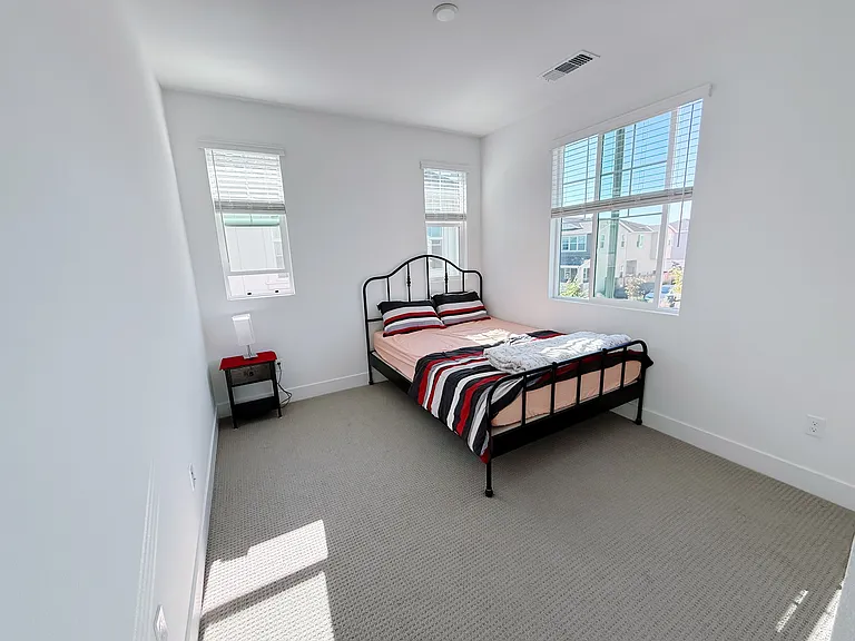 Upstairs furnished bedroom with private bathroom