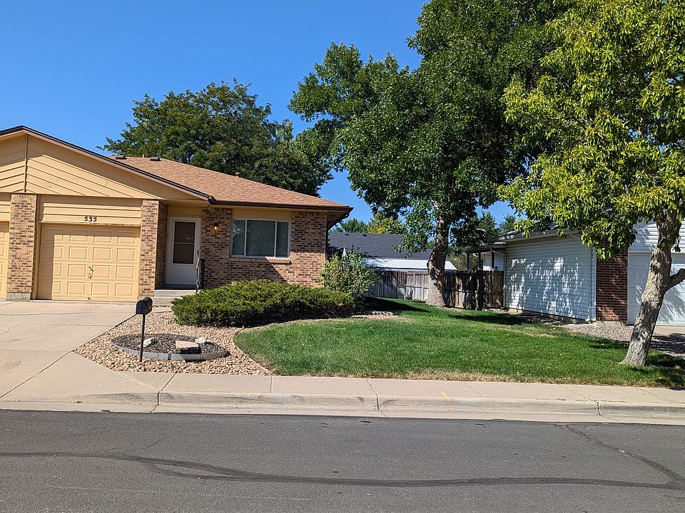 Mature trees for shade. All brick home.