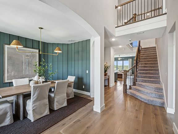 Welcoming two-story foyer entry into home