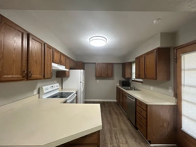 Kitchen includes Range, Refrigerator, Dishwasher, Microwave
