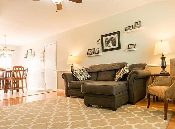 Living room with beautiful laminate flooring.