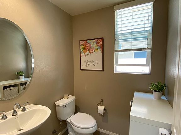 Downstairs half bath (no shower or bath).