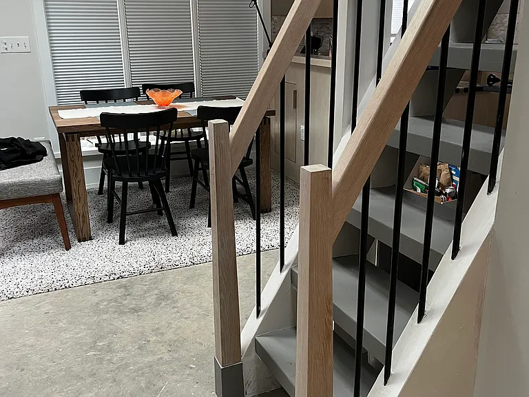 Ship ladder to sleeping-storage loft.