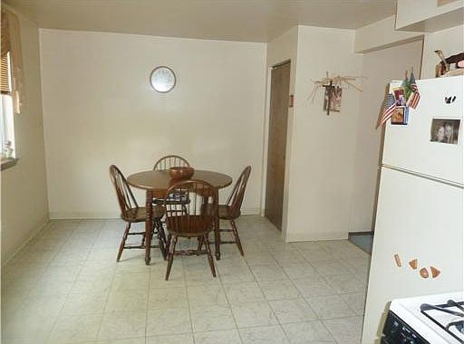 The kitchen has great space for a table and chairs