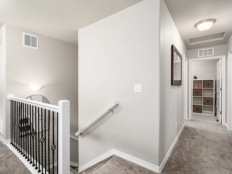 Open walk-way between bedrooms with a lot of light