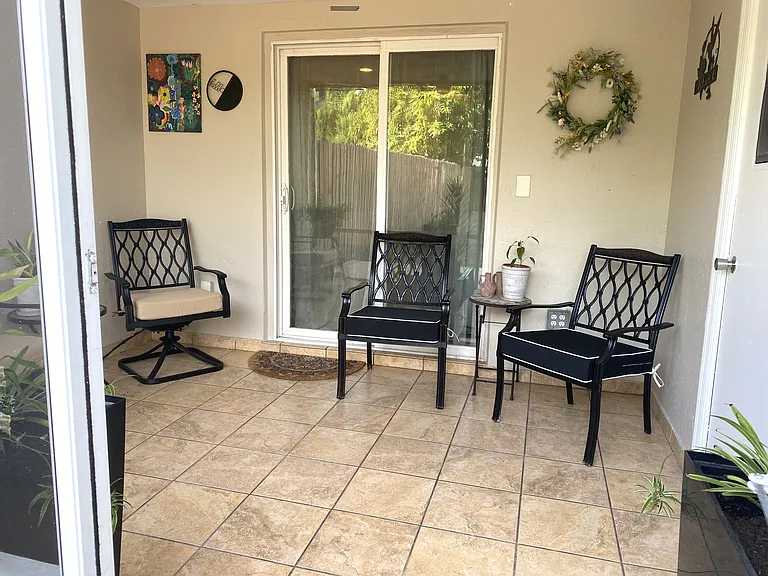 Large Patio with patio chairs and tables