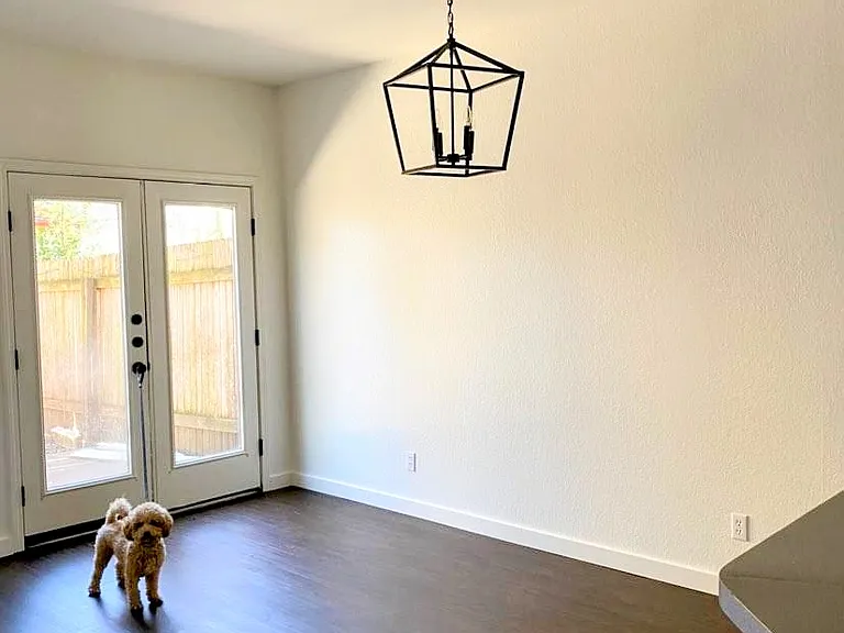Dining area with French doors to backyard