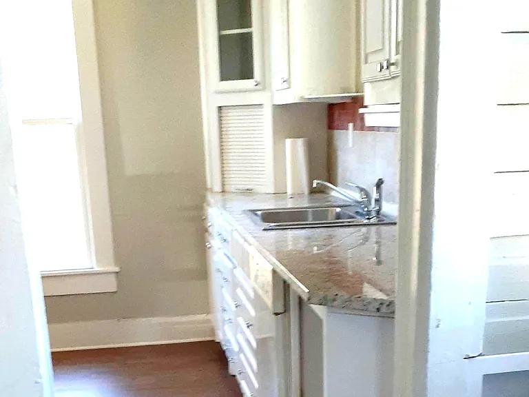 Kitchen view from laundry area