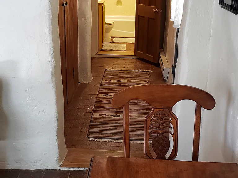 Hallway connecting Living Room w/ Bathroom & Bedroom.