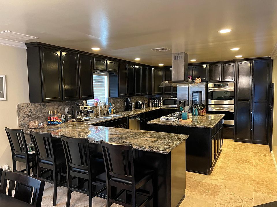 Big kitchen with stovetop island.