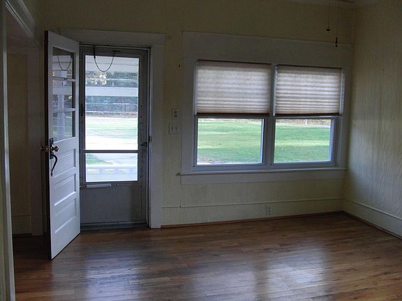 FRONT ENTRANCE VIA LIVING ROOM FACING SOUTH