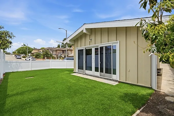 Front yard turf (backyard is real grass). Gardener is included.