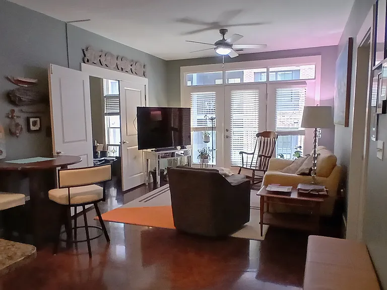 Another view of Living room looking towards balcony.