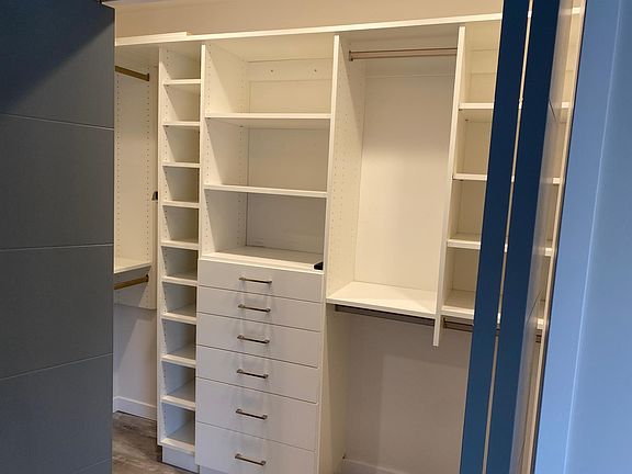 Master bedroom with walk in custom closet