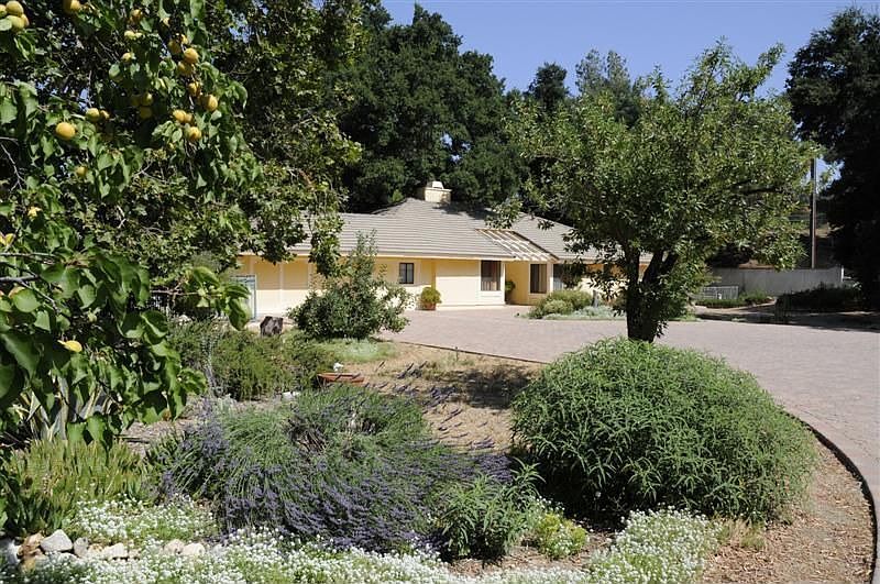 Front of House with Private Gated Driveway