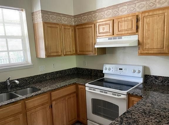 Kitchen with electric cooktop