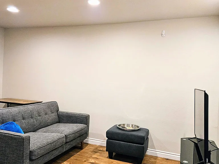 Comfy high-end love seat, smart TV, and games for your entertainment