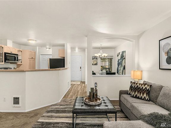 View of kitchen and dining room from living room