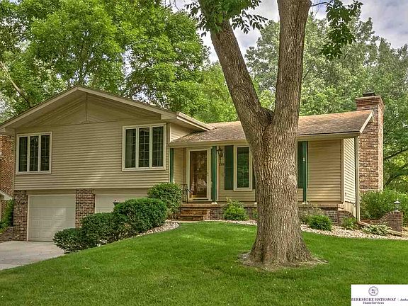 Permanent siding, and a one owner home.  This house is awesome!