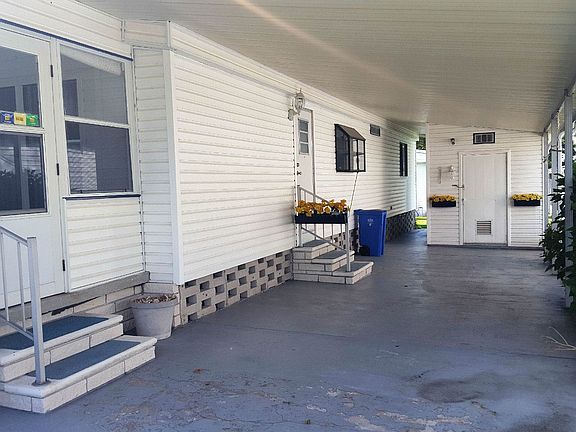 Carport and utility shed