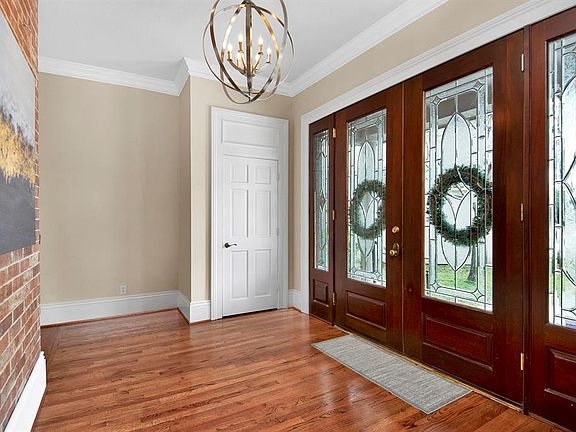Elegant foyer sets the stage for this beautifully appointed home.