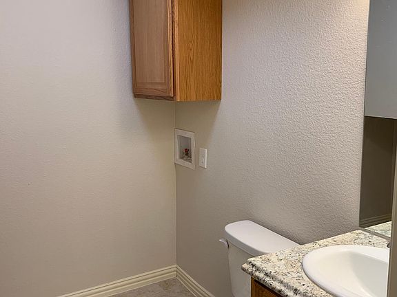downstairs 1/2 bath with laundry