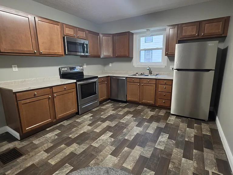 Full kitchen with a dishwasher