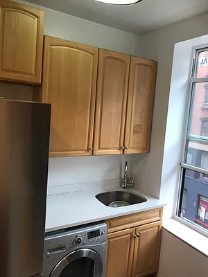 Rented by New York Realty | media 26