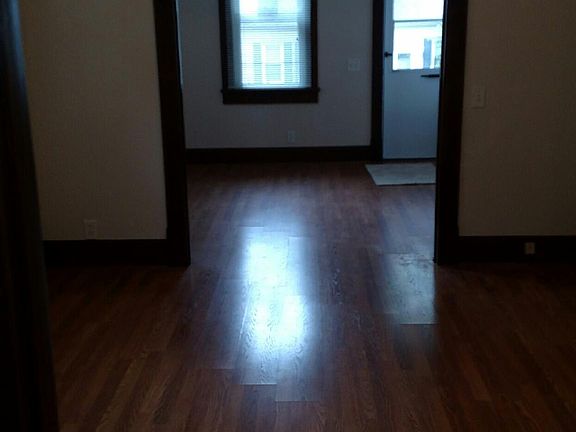 HARDWOOD FLOORS IN LIVING ROOM AND DINING ROOM
