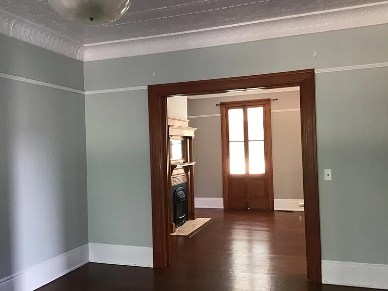 Looking from the dining room to the living room