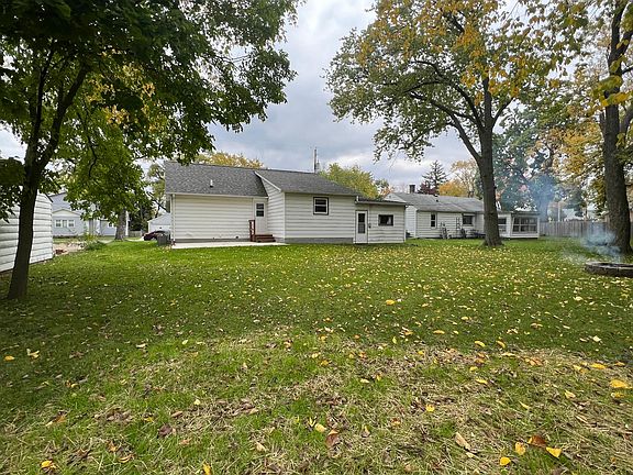 Backyard looking at rear of house
