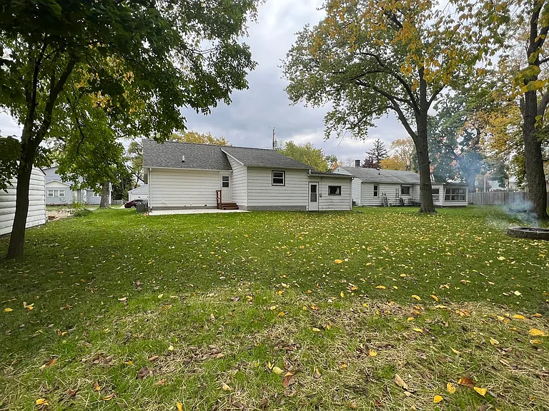 Backyard looking at rear of house