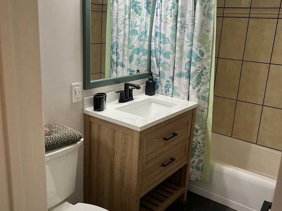 Bathroom with new vanity and toilet