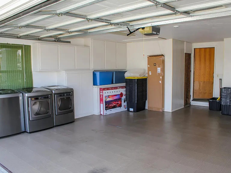 Oversized 2 car garage with storage.