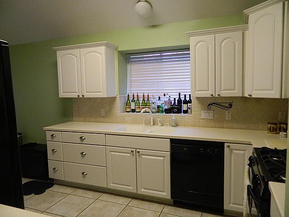 Corian counters, granite composite sink