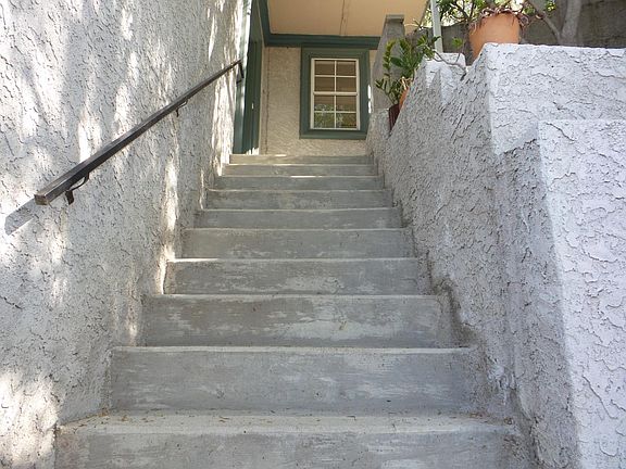 Entrance stairs to front door landing