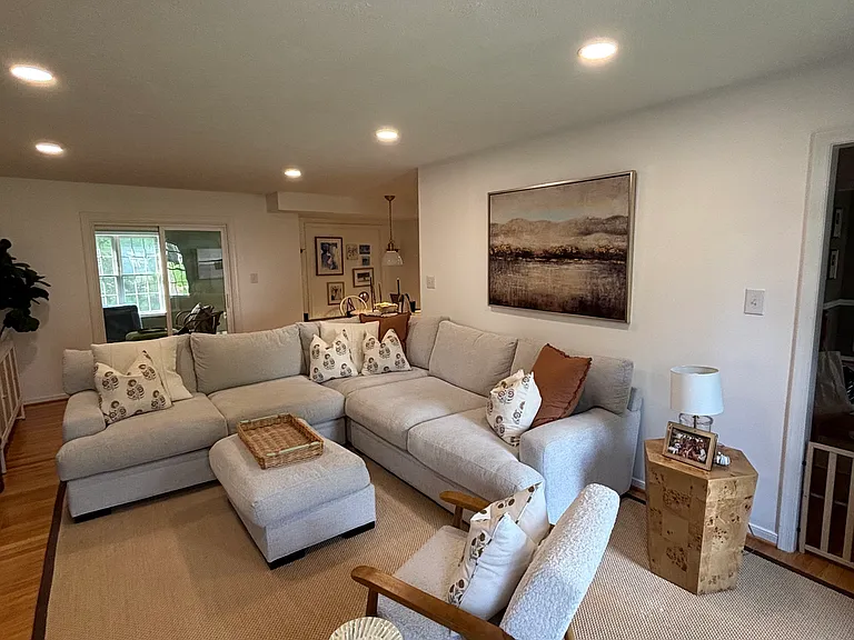 living room, office straight back through the sliding doors toward the window, kitchen open concept to the back right, and dining room to the bottom right