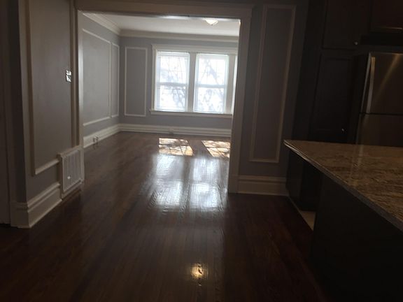 Another view, furnace closet on the left, center island on the right