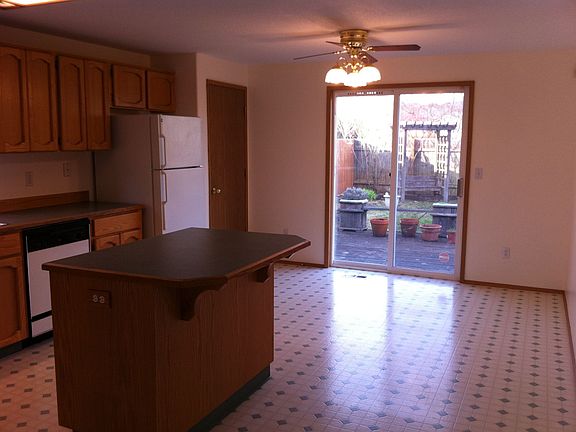Eat-in Kitchen looks out to Fenced Yard