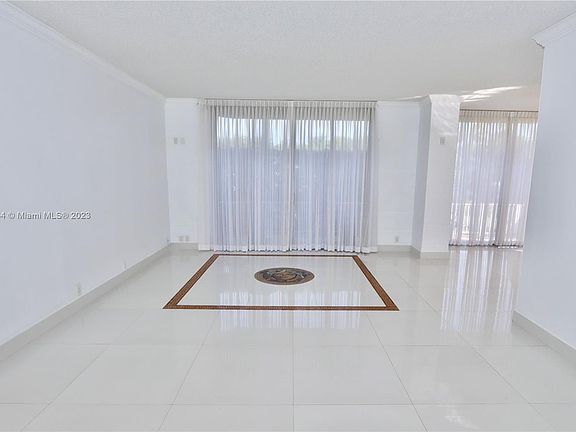 3rd image of 3500 Mystic Pointe Dr APT 105
