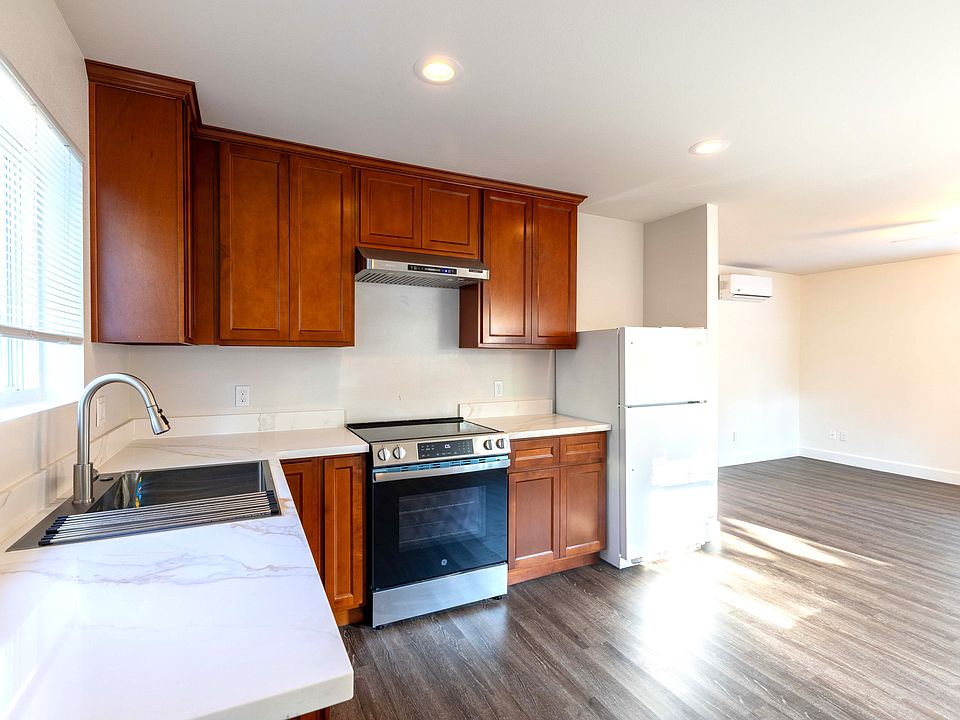 Kitchen with refrigerator included